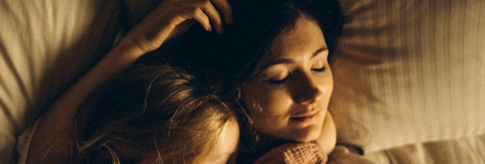 Mom sleeping with her child